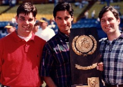 Herb Vincent with LSU athletic communications colleagues Michael Bonnette and Bill Franques after LSU won the 1996 College World Series